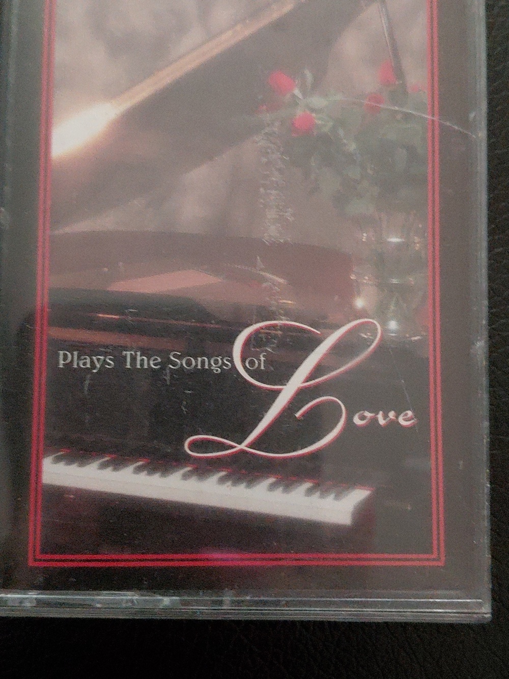 Vintage cassette tape titled "Roger Williams Plays The Songs Of Love